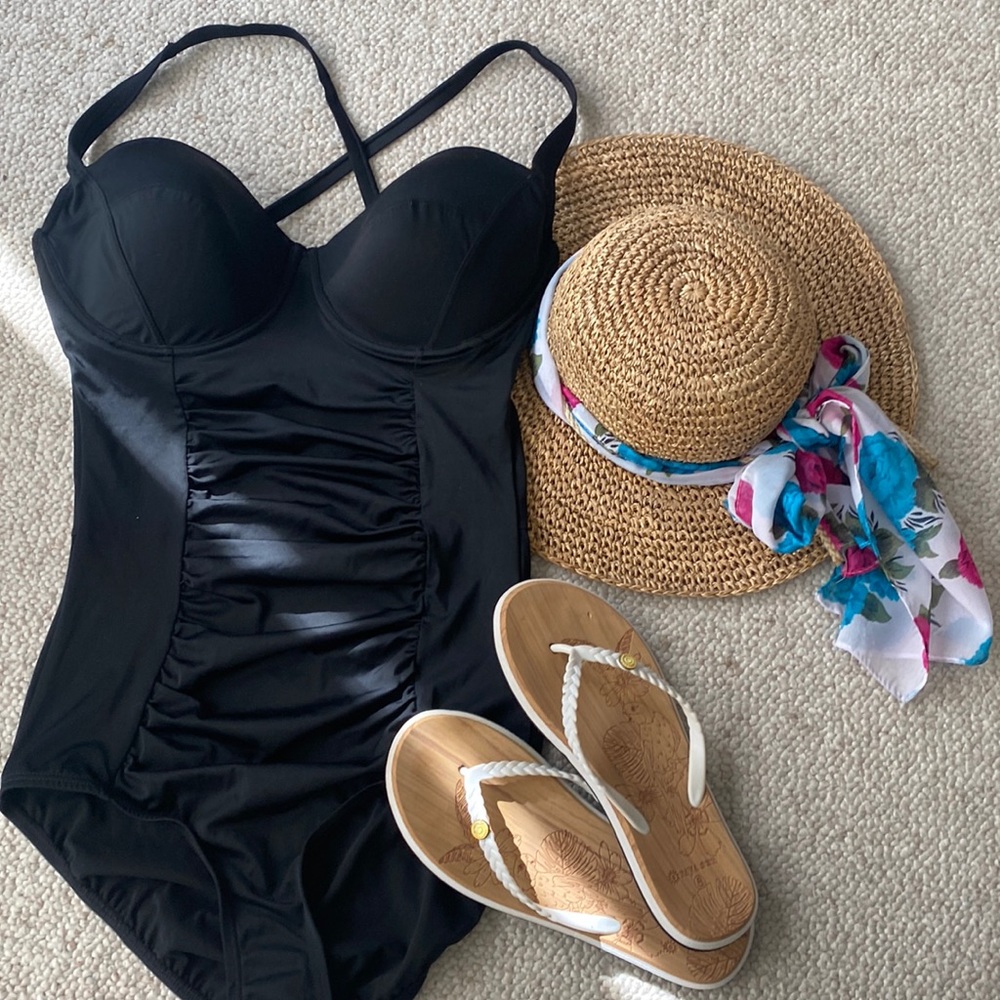NWT black one piece suit with adjustable straps